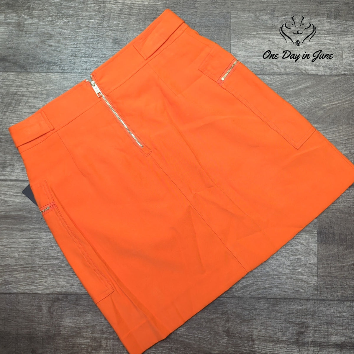 DKNY Orange Mini Skirt Gold Zip Pockets NWT Size 4